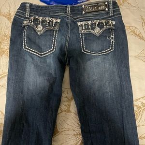 I’m selling LA idol flared pants there dark washed there a size 11